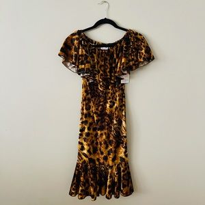 Cheetah print off the shoulder cocktail dress. Size XS